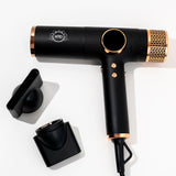 Professional stylist using Max Duo Pro for salon finish